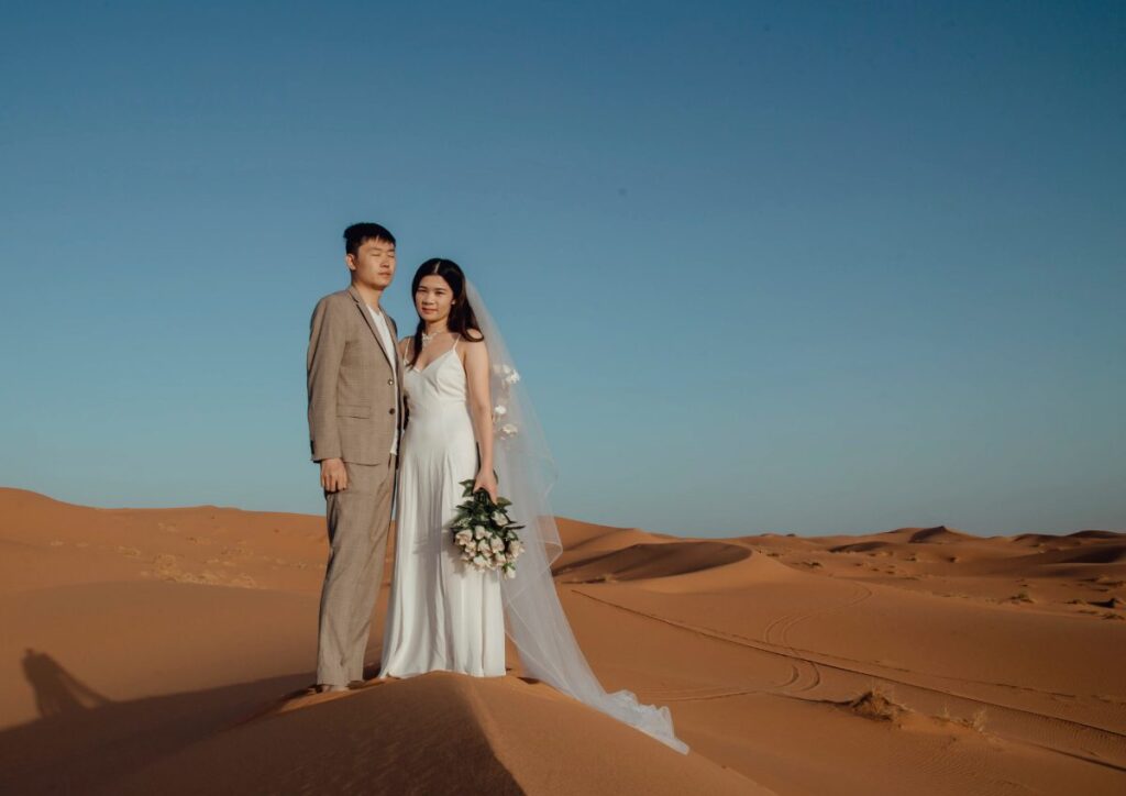 Couple wedding photoshoot Sahara dunes, Morocco