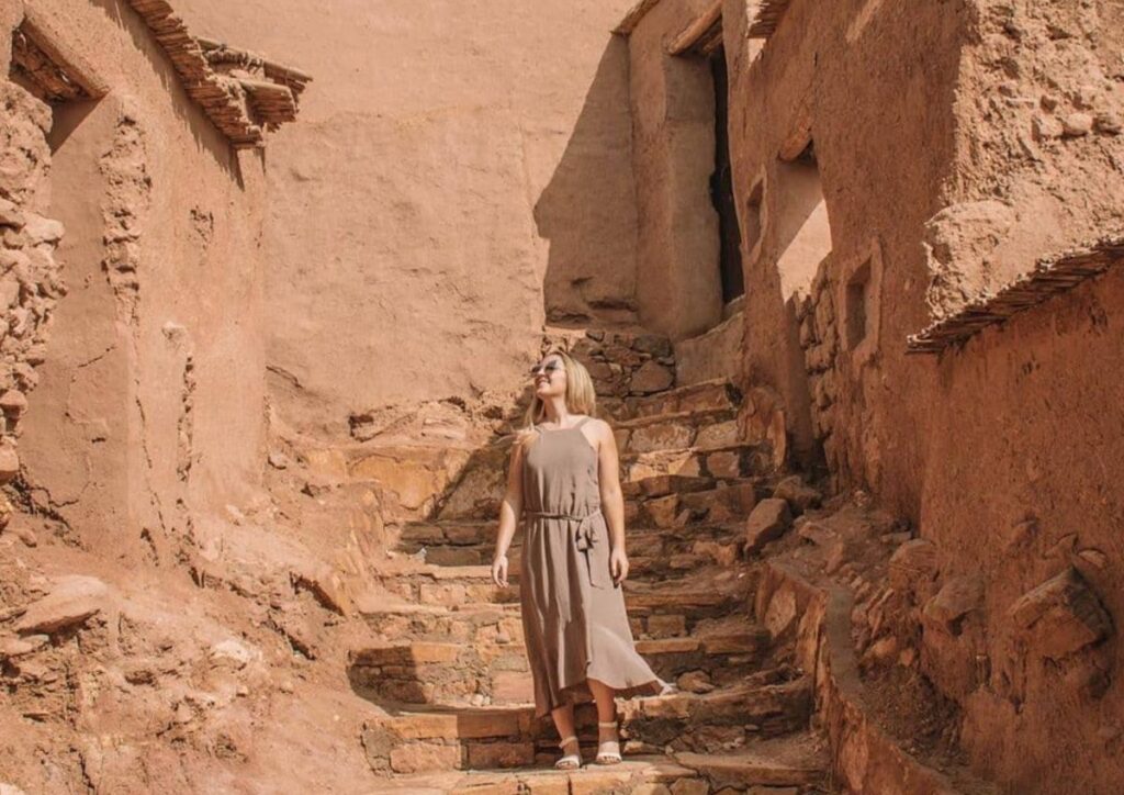 Kasbah steps woman Ait Ben Haddou, Morocco