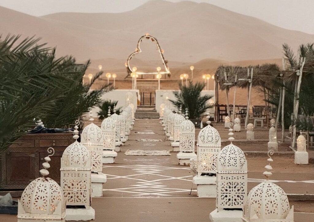 Luxury desert camp lanterns walkway, Morocco