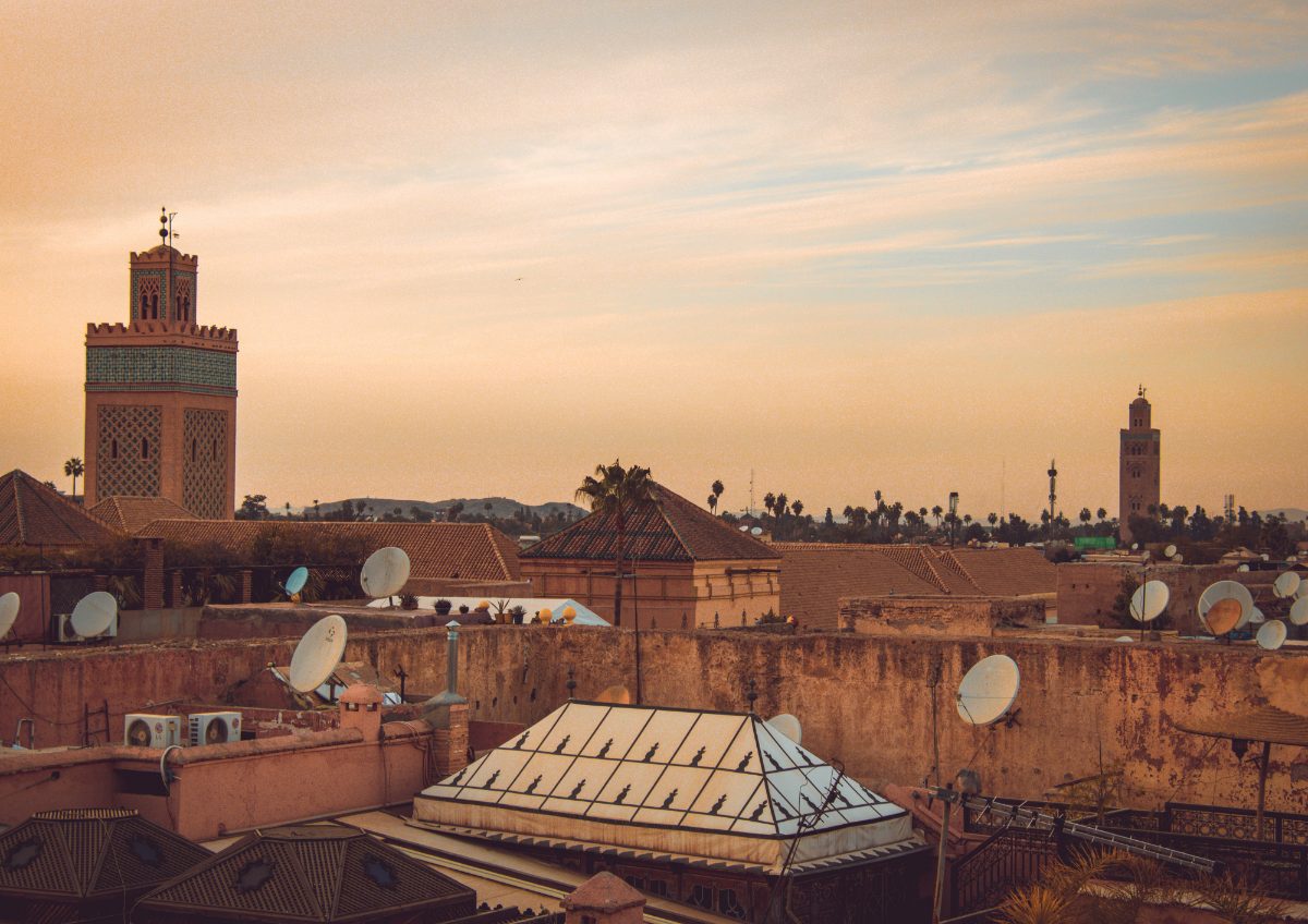 Marrakech Rooftops Koutoubia Sunset — Morocco Epic Journey guided Morocco tours across the Sahara desert, kasbahs and imperial cities.