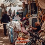 Marrakech Souk Market Vendors — Morocco Epic Journey guided Morocco tours across the Sahara desert, kasbahs and imperial cities.