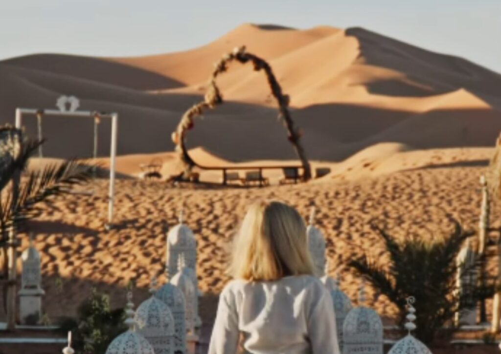 Sahara dunes heart shape woman Merzouga, Morocco
